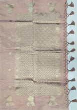Load image into Gallery viewer, Desingers tissue saree with floral patterns all over and tasselled pallu and blouse.
