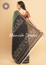 Load image into Gallery viewer, Mul Mul Pure Cotton Saree with Ikat Prints all over (GREEN-BLACK COMBINATION)
