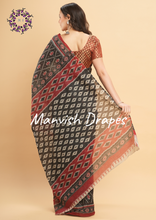 Load image into Gallery viewer, Mul Mul Pure Cotton Saree with Ikat Prints all over (BLACK PATOLA)
