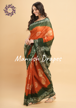 Load image into Gallery viewer, Mul Mul Pure Cotton Saree with Tie N Dye and Batiq Prints (ORANGE-GREEN COMBINATION)
