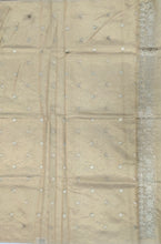 Load image into Gallery viewer, Desingers tissue saree with floral patterns all over and tasselled pallu and blouse.

