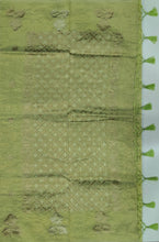 Load image into Gallery viewer, Desingers tissue saree with floral patterns all over and tasselled pallu and blouse.
